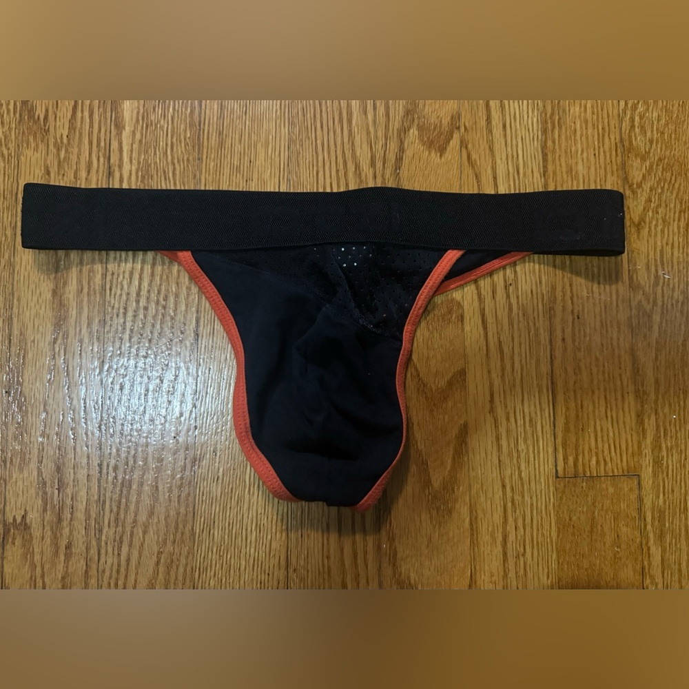 Men’s IZ10 Thong, slightly worn, comfortable.